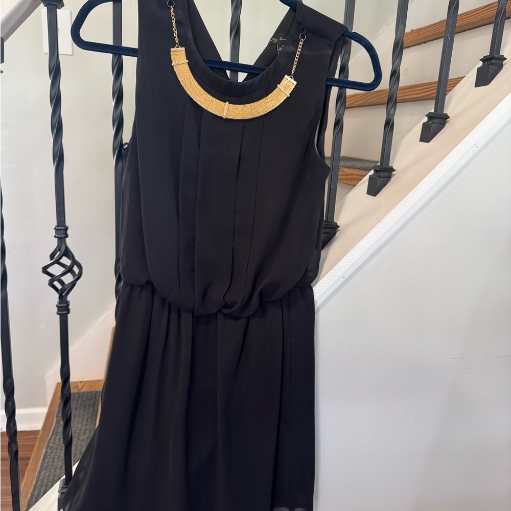 City Triangles Black Sleeveless Mini Dress with Gold Necklace Accent